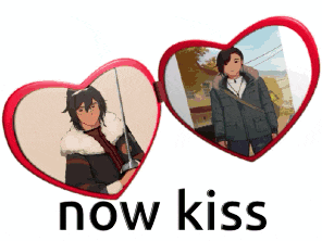 two heart shaped mirrors with a picture of a man and the words now kiss below them