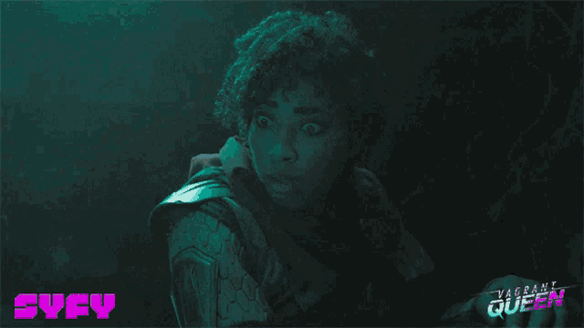 a poster for vagrant queen shows a woman in a dark room