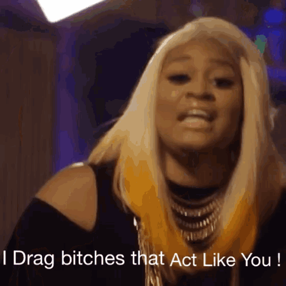 a picture of a woman with the words i drag bitches that act like you