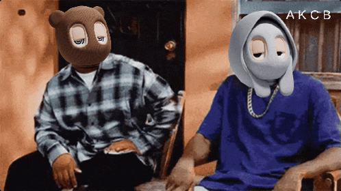 two men wearing masks are sitting next to each other with akcb written in the corner