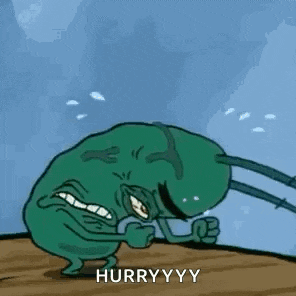 a cartoon character from spongebob squarepants is standing on a wooden floor and crying .