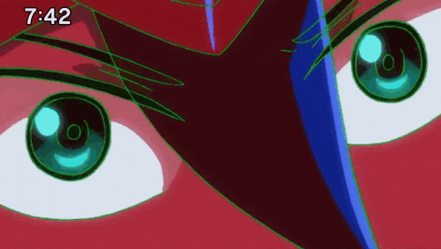 a close up of a cartoon character 's eyes with the time 7:42 on the bottom