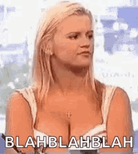 a woman with a very large breast is wearing a white tank top and says blahblahblah