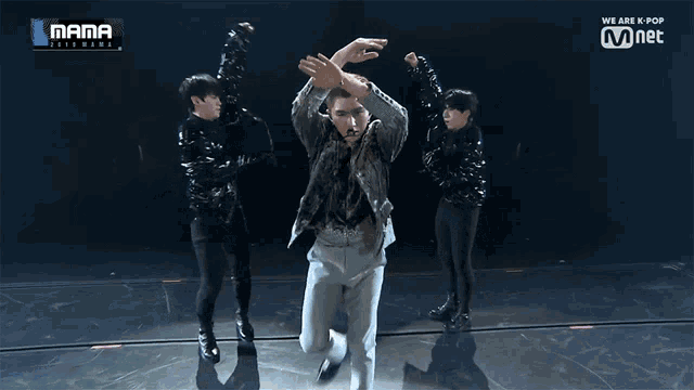 a blurred image of a man dancing with the words mama on the bottom
