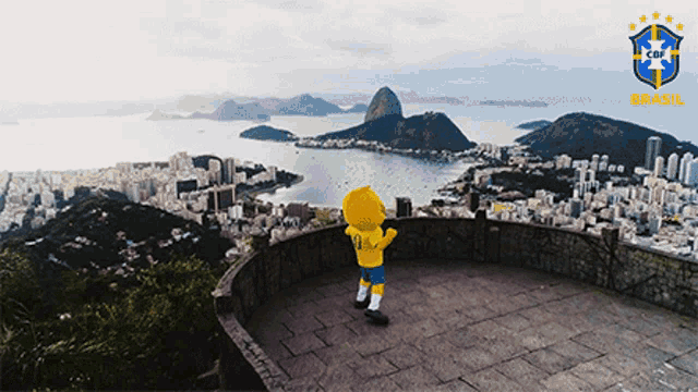 a mascot with the number 10 on his shirt stands on a balcony overlooking a city