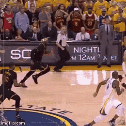 a basketball game is being played on a court with a sign that says nightly pm 12 am