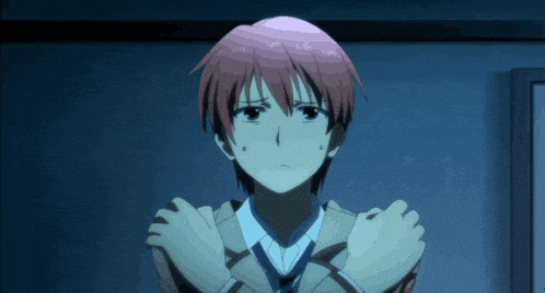 a boy with red hair and a white shirt and tie looks shocked