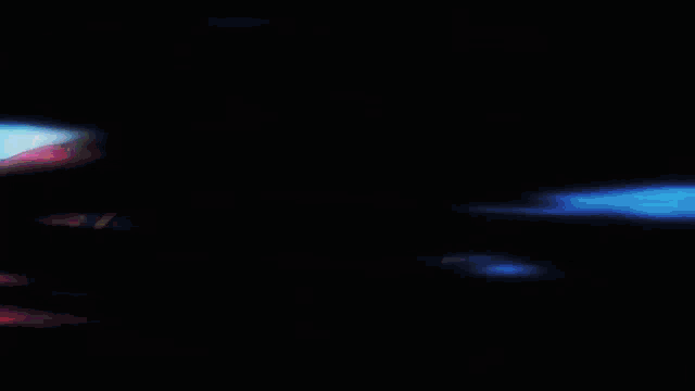 a person 's hand is visible in a blurry picture