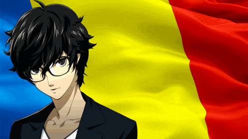 a boy with glasses is standing in front of a yellow and red flag