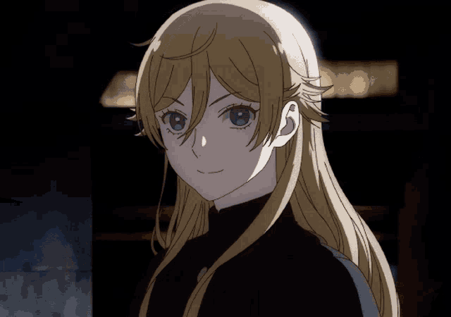 a girl with long blonde hair is wearing a black sweater
