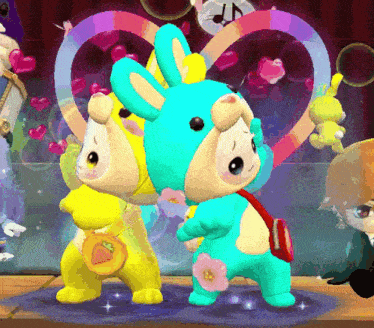 a couple of stuffed animals are standing next to each other