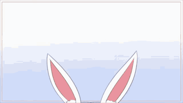 a girl with bunny ears and a carrot in her hand