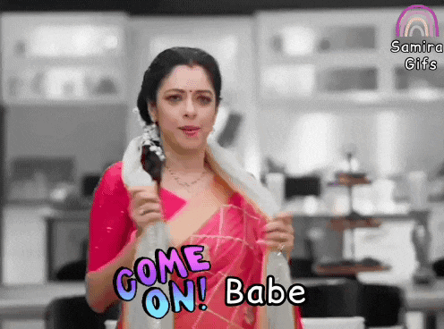 a woman in a pink saree is holding a white cloth and says come on babe