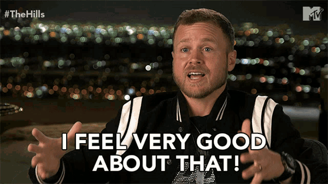 a man says " i feel very good about that " in front of a city