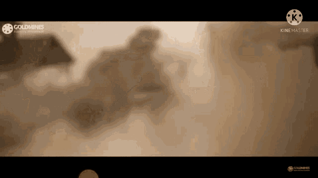 a screenshot of a video with a watermark that says goldmines on it