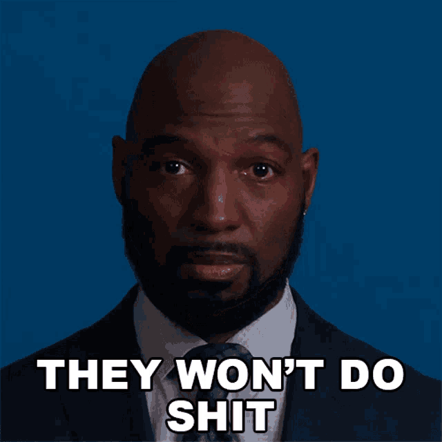 a bald man in a suit and tie says they won 't do shit