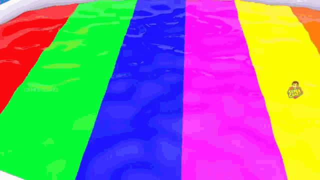 a pool filled with rainbow colored water with a monkey on the bottom right corner