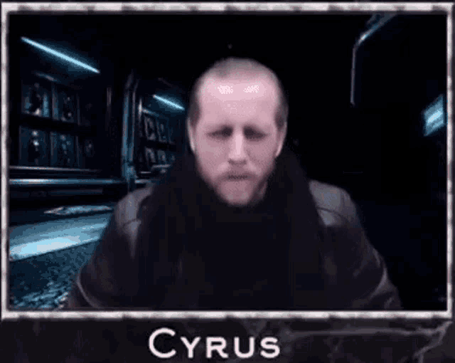 a picture of a man with a scarf around his neck and the name cyrus on the bottom