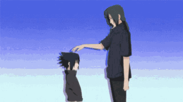 a man in a black shirt is touching the head of another man in a black shirt