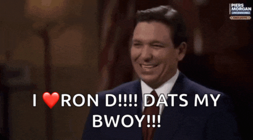 a man in a suit and tie says that he loves ron d.