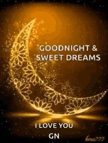 a glowing crescent moon with the words `` goodnight and sweet dreams `` written on it .