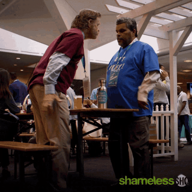 a poster for shameless show shows two men talking