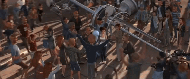 a group of people are standing around a cartoon character with a huge head