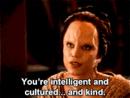 a woman with a mask on her face says " you 're intelligent and cultured ... and kind "