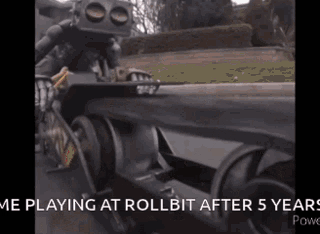 a robot is riding a roller coaster on a street .