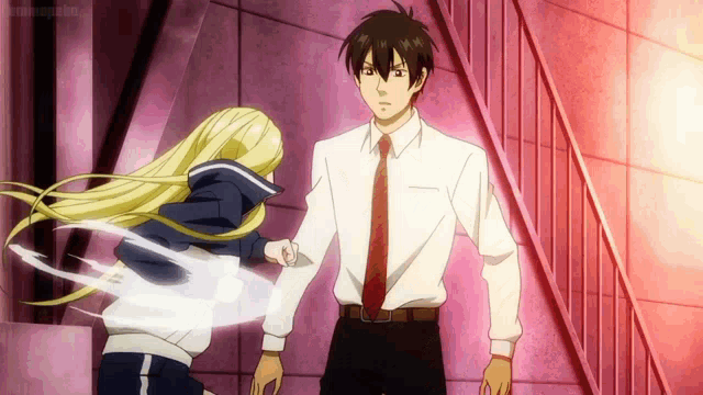 a man and a woman are standing next to each other and the man is wearing a white shirt and tie