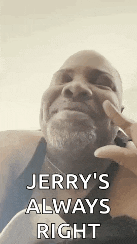 a man with a beard is talking on a cell phone and jerry 's always right is written on his face .