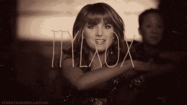 a black and white photo of a woman with the words try laox