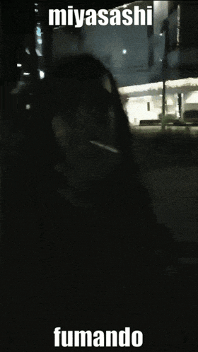 a black and white photo of a person with the words miyaashi fumando on the bottom