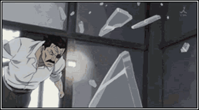 a man is standing in front of a broken glass door