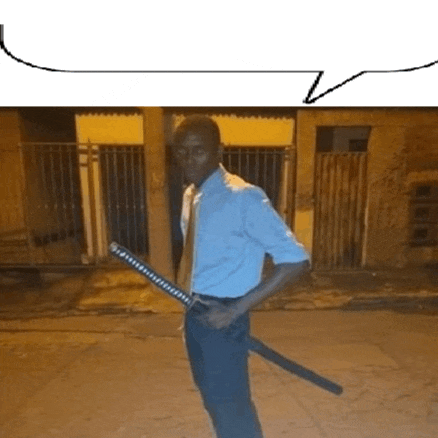 a man in a blue shirt and tie holds a large sword