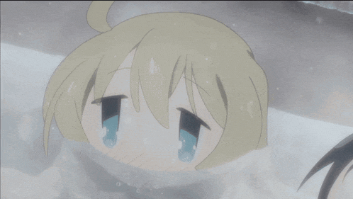 a girl with blonde hair and blue eyes is laying in a bathtub