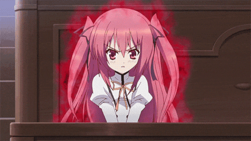 a girl with pink hair and red eyes is sitting in a dark room
