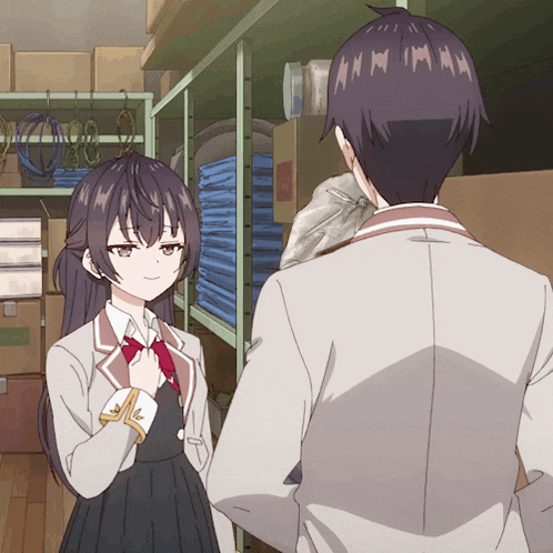 a man and a girl are standing next to each other in a room