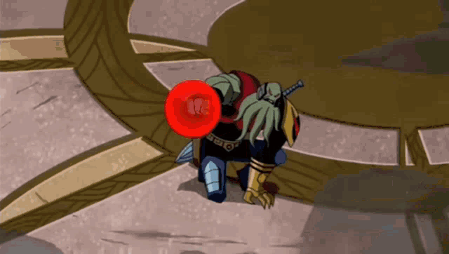 a cartoon character is holding a red object that says ' i 'm sorry ' on it