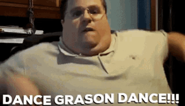 a fat man with glasses is sitting in a chair and saying `` dance grason dance !! ''
