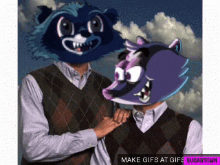 a man with a raccoon mask on his head and another man with a badger mask on his head