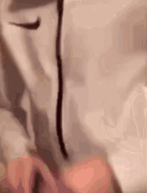 a close up of a person wearing a nike sweatshirt