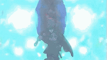 a person is swimming in a pool with a mask on .