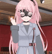 a girl with pink hair and a mask on her face is wearing a jacket .