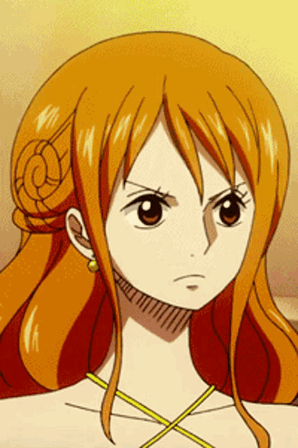 a close up of a girl with orange hair