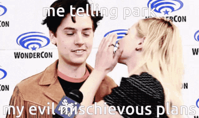 a woman whispering into a man 's ear with the words " me telling park my evil mischievous plans "