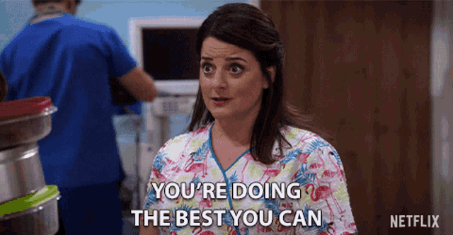 a woman in a flamingo scrub says you 're doing the best you can