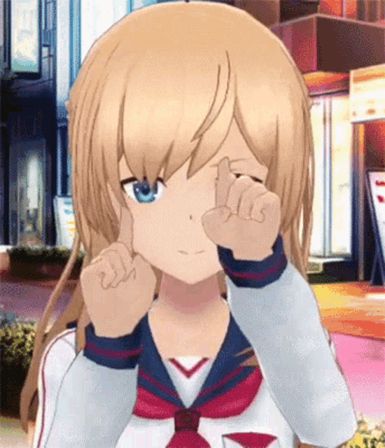 a blonde anime girl with blue eyes is making a face
