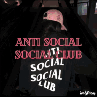 a girl wearing an anti social social club hoodie