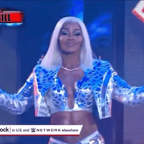 a woman in a blue and silver outfit is standing in front of a wwe logo